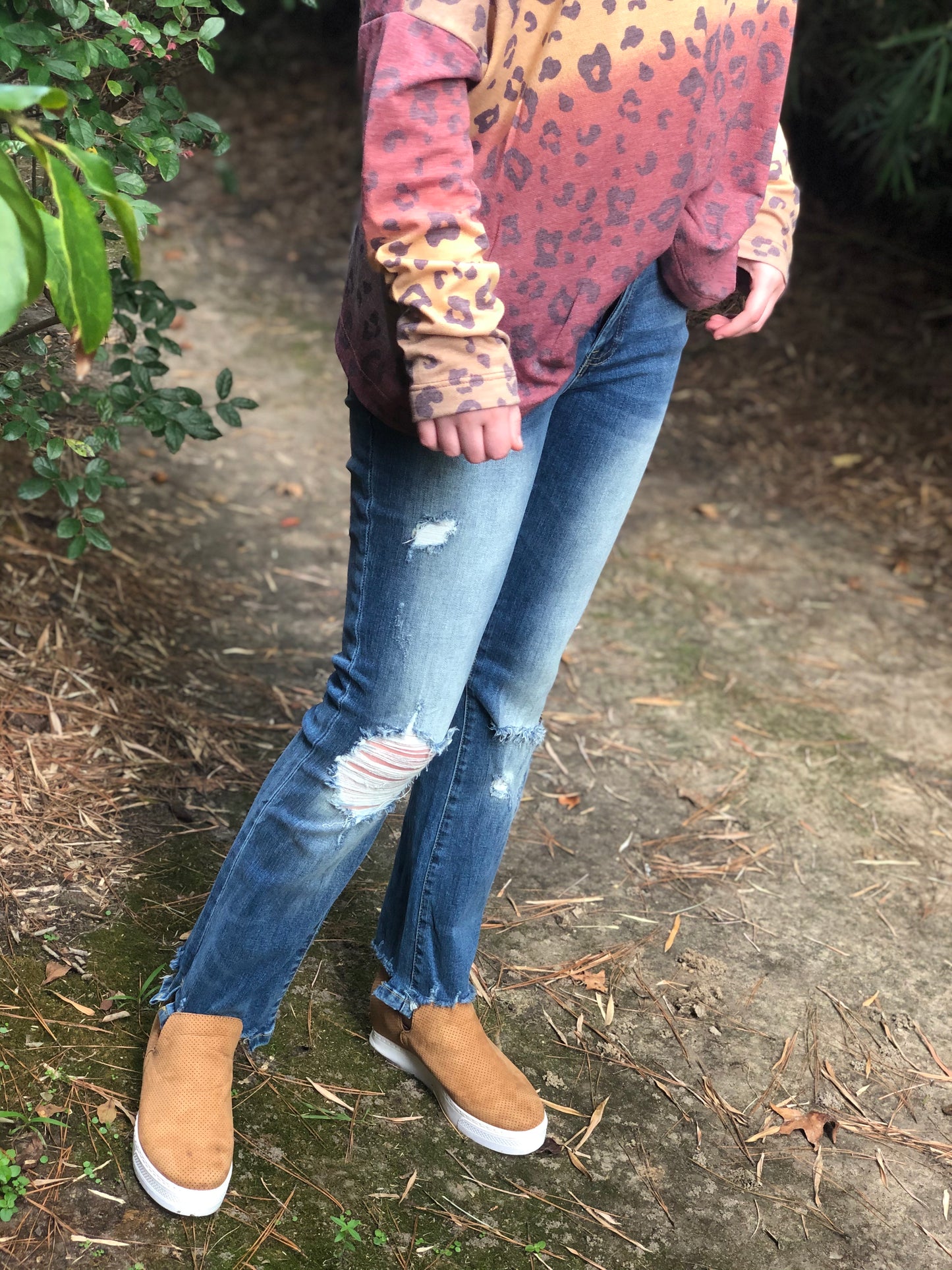 Distressed Mid Rise Kick Flare with Release Hem Jeans